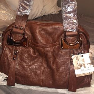 Brand new, never opened B MAKOWSKY purse